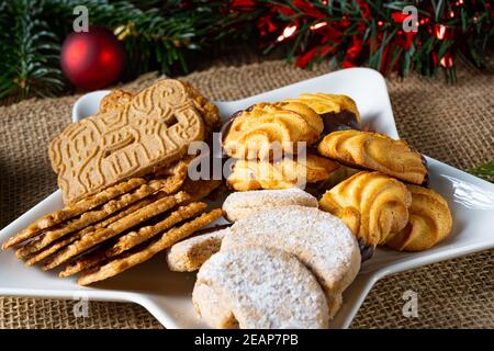 Different types of biscuits with rustic Christmas decorations Stock Photo