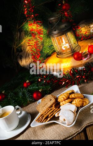Different types of biscuits with rustic Christmas decorations Stock Photo