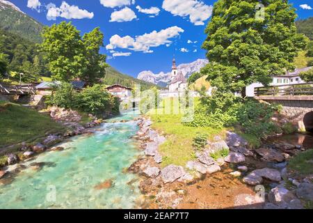 Sankt Sebastian pilgrimage church with alpine turquoise river alpine landscape view, Ramsau Stock Photo