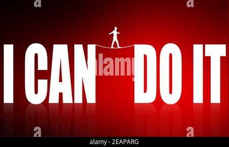 Man walking on rope with I can do it word Stock Photo