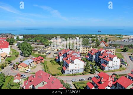 cityscape of Wladyslawowo town from above with streets houses cars and sea Stock Photo