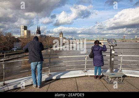 Cologne, Germany, February 4th. 2021, flood of the river Rhine, view from the terrace of the Chocolate Museum to the cathedral.  Koeln, Deutschland, 4 Stock Photo