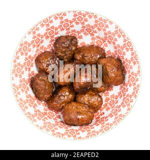 cooked swedish meatballs in bowl isolated Stock Photo