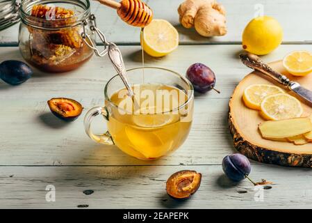 Cup of tea with lemon, honey and ginger Stock Photo