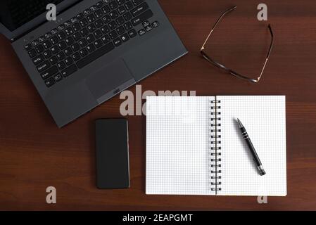 Top view of wooden office desk table Stock Photo