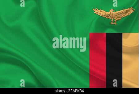 Zambia country flag on wavy silk fabric background panorama Stock Photo