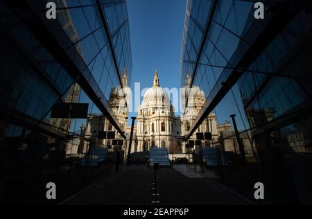 St Pauls Cathedral reflected in glass offices Stock Photo