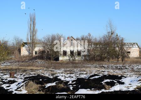 Abandoned house. The old structure of kindergarten. Winter on the abandoned buildings Stock Photo