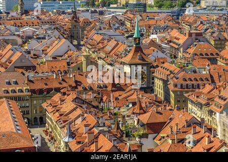 Aerial view of Bern old town, Switzerland, UNESCO World Heritage Site since 1983 from Cathedral bell tower. Details of Zytglogge or Clock Tower and Stock Photo