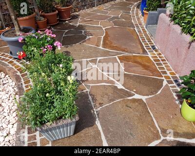 Gartenweg, Natursteinplatten, Porphyr Stock Photo