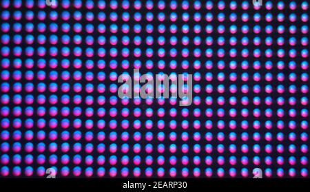 Digital screen background. Color screen monitor or TV with glitch pixels and LEDs close up. Stock Photo