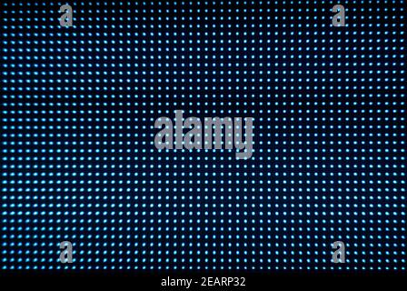 Digital screen background. Color screen monitor or TV with glitch pixels and LEDs close up. Stock Photo