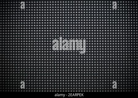 Digital screen background. Black screen monitor or TV with pixels and LEDs close up. Stock Photo
