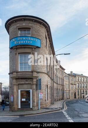 The narrow curved entrance to the offices of the Dewsbury Reporter, a local newspaper in Dewsbury, West Yorkshire Stock Photo