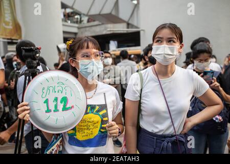 Bangkok, Thailand. 10th Feb, 2021. A female protester hold a kitchen utensil written 'No to article 112' on it during a 'make noise' protest to denounce the recent junta military coup in Myanmar and reject Article 112 of the Thai penal code. Credit: SOPA Images Limited/Alamy Live News Stock Photo