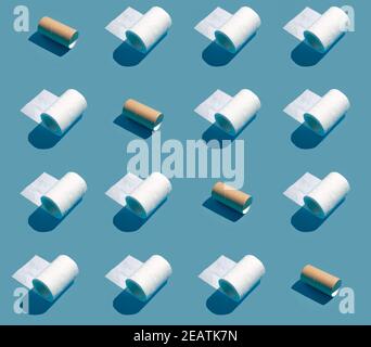 Toilet paper rolls arranged in a pattern in combination with empty rolls Stock Photo