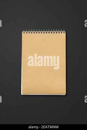 Spiral closed notebook mockup on black background Stock Photo