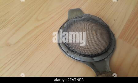 Close up view of chinois with metal gaze use for tea infusion Stock Photo