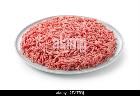 Minced meat served on a plate on a white background Stock Photo