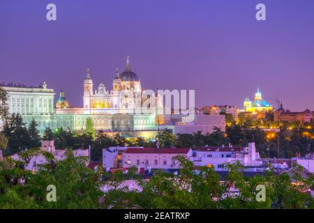 Sunset view of skyline of Madrid with Santa Maria la Real de La Almudena Cathedral and the Royal Palace, Spain Stock Photo