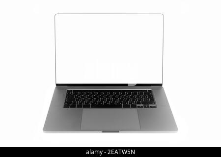 Laptop with a white blank screen and a thin frame, in an aluminum body on a white background Stock Photo