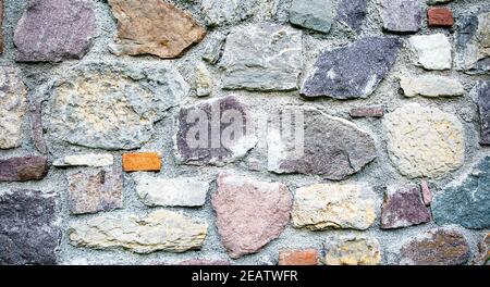 Fragment of a wall from a chipped stone Stock Photo