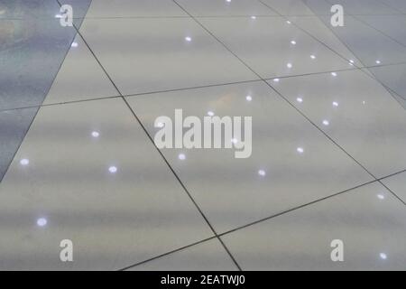 Decorative exterior coating of warm colored marble crumb close-up Stock Photo