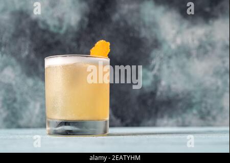 Glass of whiskey sour Stock Photo