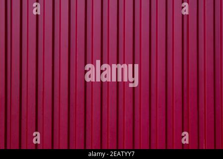 Panorama of Red Corrugated metal background and texture surface or galvanize steel , Red metal sheet wall or fence seamless background Stock Photo