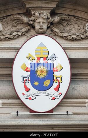 Coat of arms of Pope Francis on the portal of Sant Andrea della Valle Church in Rome, Italy Stock Photo