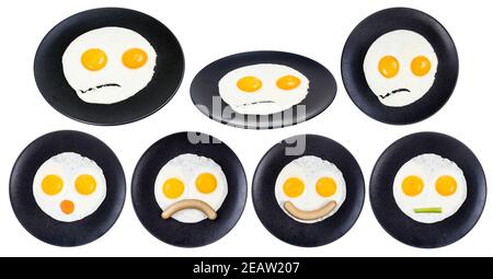 set of various fried eggs with faces isolated Stock Photo