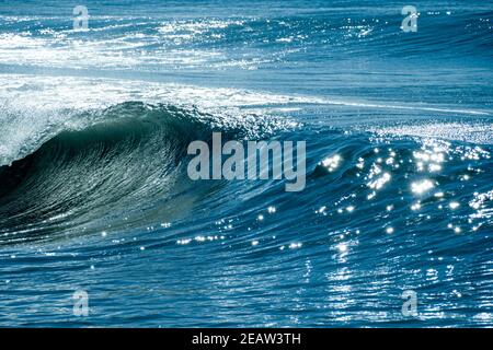 Colorful splash of waves close-up in the mediterranean sea.  Stock Photo