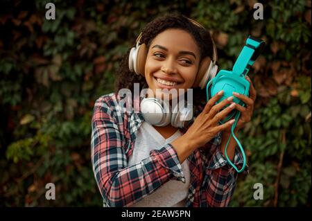 Music lover in headphones listening to music Stock Photo