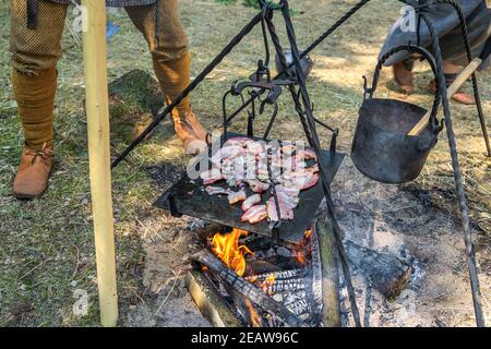 Bacon in a Cast Iron Frying Pan Cooking on a Campfire ! Stock Photo - Image  of black, cooking: 102405834