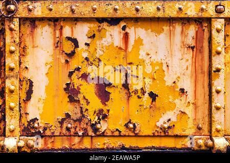 Background panel of rusty grunge iron steel with pealing distressed paint texture Stock Photo