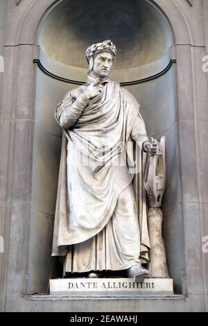 Dante Alighieri in the Niches of the Uffizi Colonnade. The first half of the 19th Century they were occupied by 28 statues of famous people in Florence, Italy Stock Photo