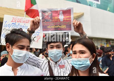 Bangkok, Thailand. 10th Feb, 2021. Myanmar people living in Thailand protest against the Burmese military coup today at Pathumwan intersection. (Photo by Teera Noisakran/Pacific Press) Credit: Pacific Press Media Production Corp./Alamy Live News Stock Photo