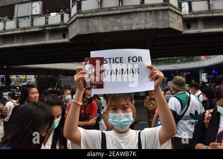 Bangkok, Thailand. 10th Feb, 2021. Myanmar people living in Thailand protest against the Burmese military coup today at Pathumwan intersection. (Photo by Teera Noisakran/Pacific Press) Credit: Pacific Press Media Production Corp./Alamy Live News Stock Photo