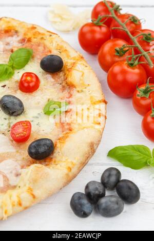 Pizza margarita margherita baking ingredients on wooden board portrait format Stock Photo