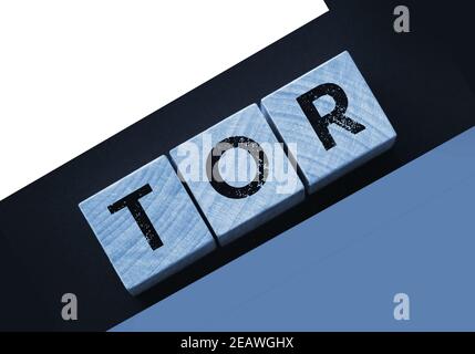 Tor anonymous by letters on a woden blocks on black. Business concept. Stock Photo