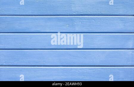 Cyan blue wood background and alternative construction material - Textured wooden panel in outer fence structure - Retro old fashioned backdrop Stock Photo