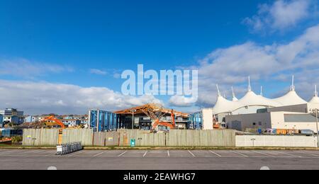 Demolition of the old swimming pool, which opened in 1987, taking place at Butlins in Bognor Regis, West Sussex, UK. Stock Photo