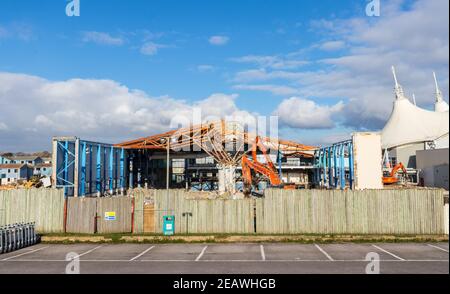 Demolition of the old swimming pool, which opened in 1987, taking place at Butlins in Bognor Regis, West Sussex, UK. Stock Photo