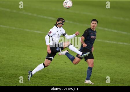 Swansea, UK. 10th Feb, 2021. Yan Dhanda of Swansea city controls the ball. The Emirates FA Cup, 5th round match, Swansea city v Manchester City at the Liberty Stadium in Swansea, South Wales on Wednesday 10th February 2021. this image may only be used for Editorial purposes. Editorial use only, license required for commercial use. No use in betting, games or a single club/league/player publications. pic by Andrew Orchard/Andrew Orchard sports photography/Ģ����ý Live news Credit: Andrew Orchard sports photography/Ģ����ý Live News Stock Photo