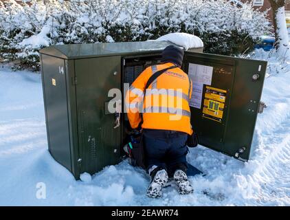 BT Openreach engineer working on a superfast broadband telephone exchange near Livingston West Lothian. Stock Photo