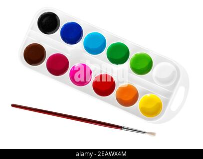 Watercolor paints in box isolated on white background. Set of watercolor paints, brushes for painting. Stock Photo
