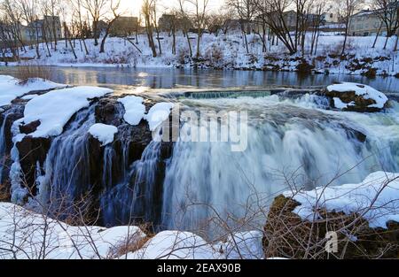 PATERSON, NJ -6 FEB 2021- Winter view of the Great Falls of the Passaic River, part of the Paterson Great Falls National Historical Park in New Jersey Stock Photo