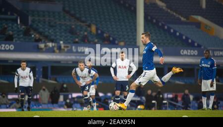 Liverpool. 11th Feb, 2021. Everton's Gylfi Sigurdsson score a goal from a penalty-kick during the FA Cup 5th round match between Everton FC and Tottenham Hotspur FC at Goodison Park in Liverpool, Britain on Feb. 10, 2021. Credit: Xinhua/Alamy Live News Stock Photo