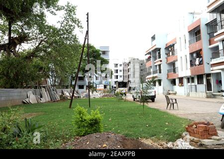 A ground level view of a completed apartment and a under construction apartment Stock Photo