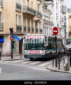 RATP Driving school bus in Paris streets - France Stock Photo